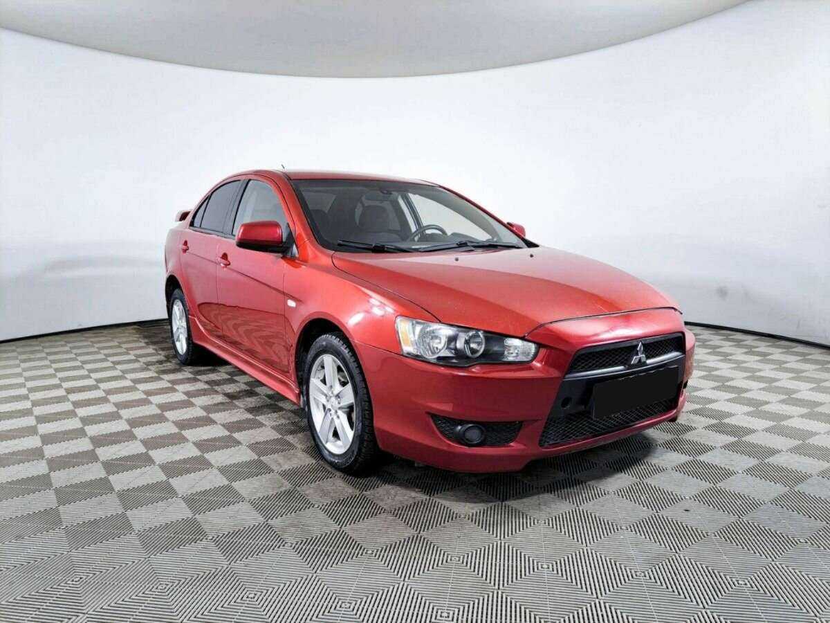 Купить Mitsubishi Lancer с пробегом. Фото: #2