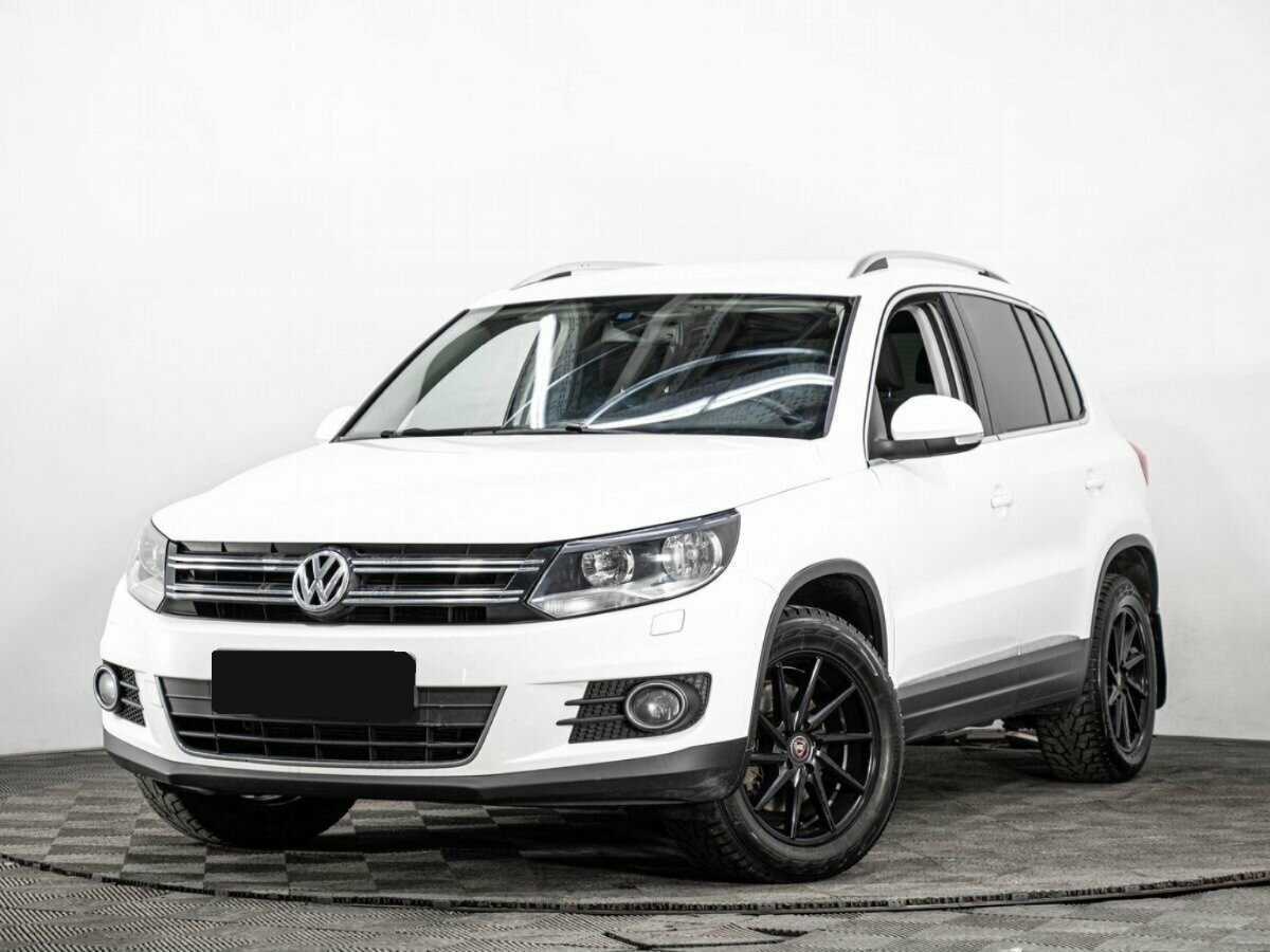 Купить Volkswagen Tiguan с пробегом. Посмотреть фото