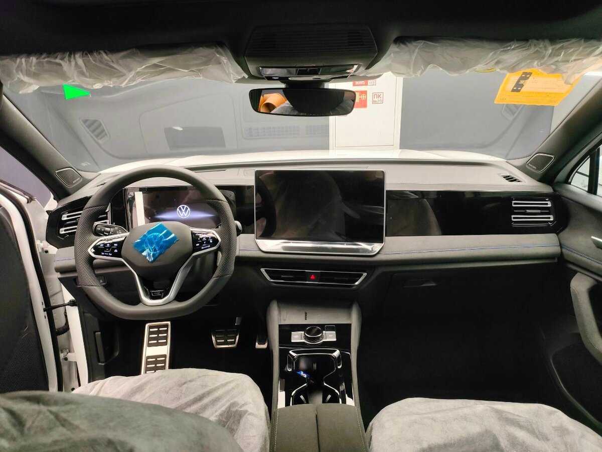 Купить Volkswagen Tiguan с пробегом. Фото: #6