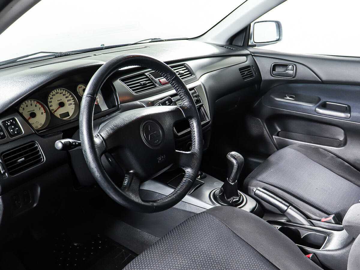 Купить Mitsubishi Lancer с пробегом. Фото: #12