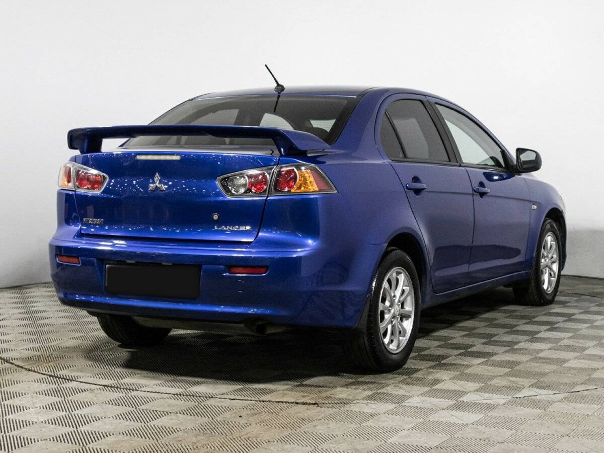 Купить Mitsubishi Lancer с пробегом. Фото: #4