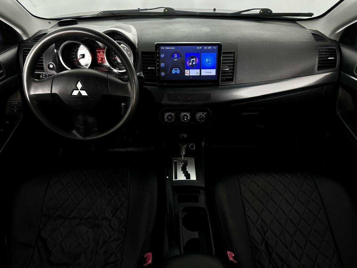 Купить Mitsubishi Lancer с пробегом. Фото: #8