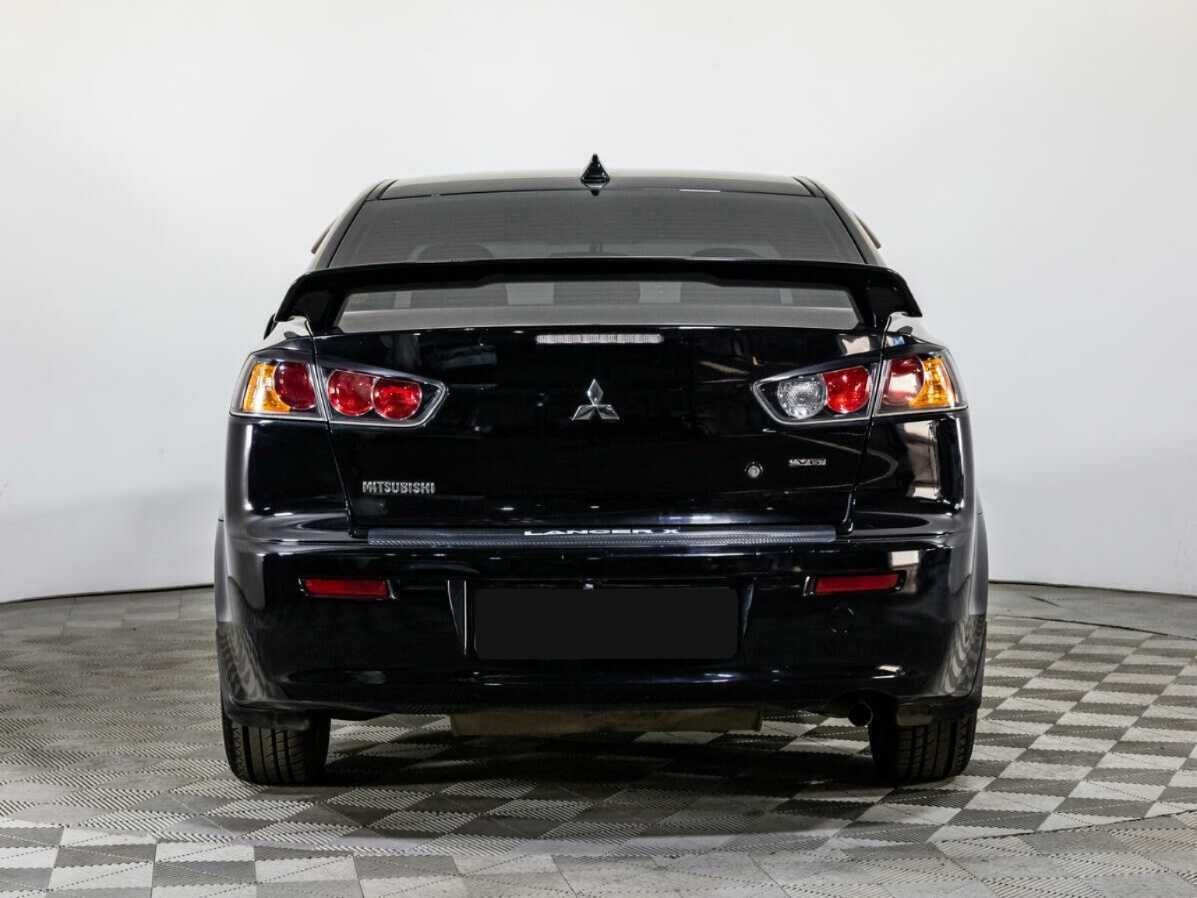 Купить Mitsubishi Lancer с пробегом. Фото: #4
