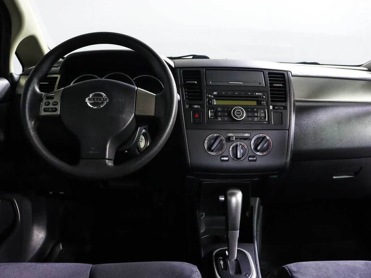 Купить Nissan Tiida с пробегом. Фото: #9