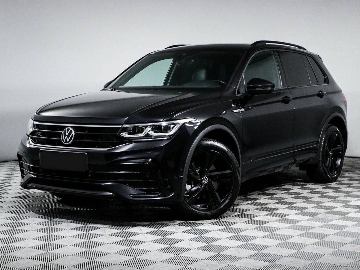 Купить Volkswagen Tiguan с пробегом. Посмотреть фото