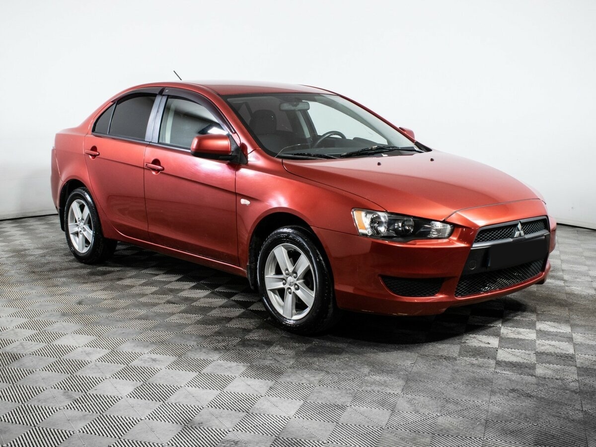 Купить Mitsubishi Lancer с пробегом. Фото: #2