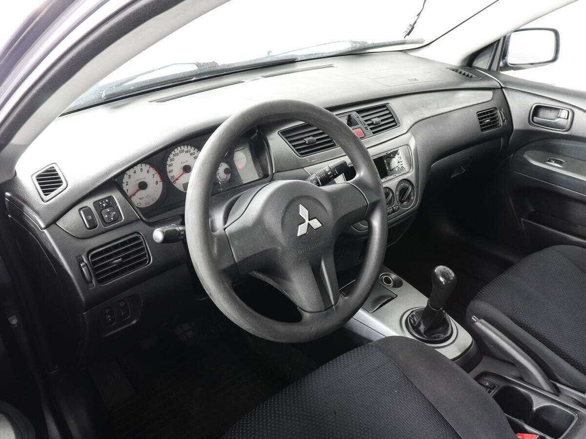 Купить Mitsubishi Lancer с пробегом. Фото: #4