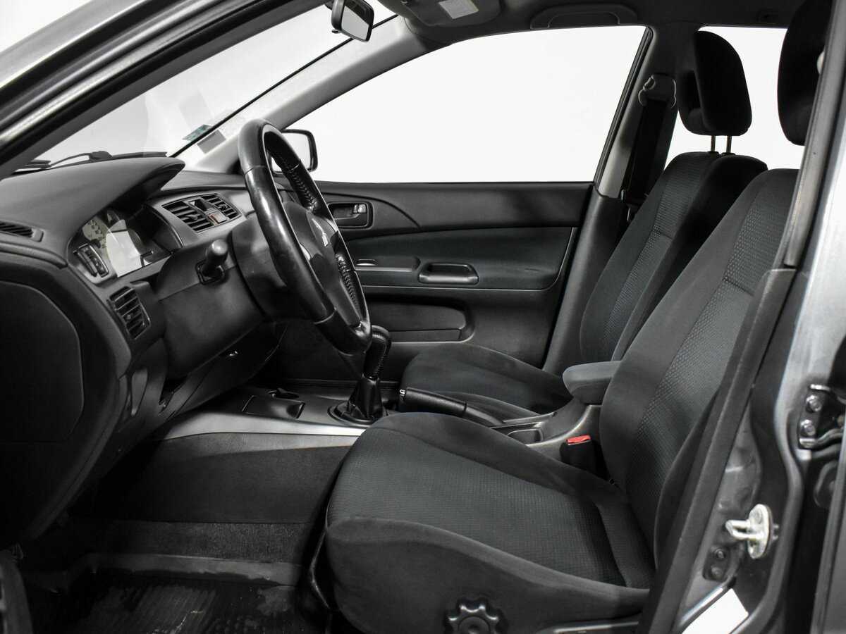 Купить Mitsubishi Lancer с пробегом. Фото: #6