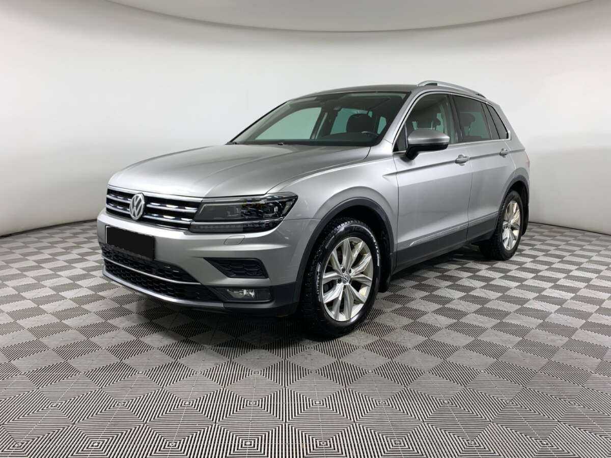 Купить Volkswagen Tiguan с пробегом. Посмотреть фото