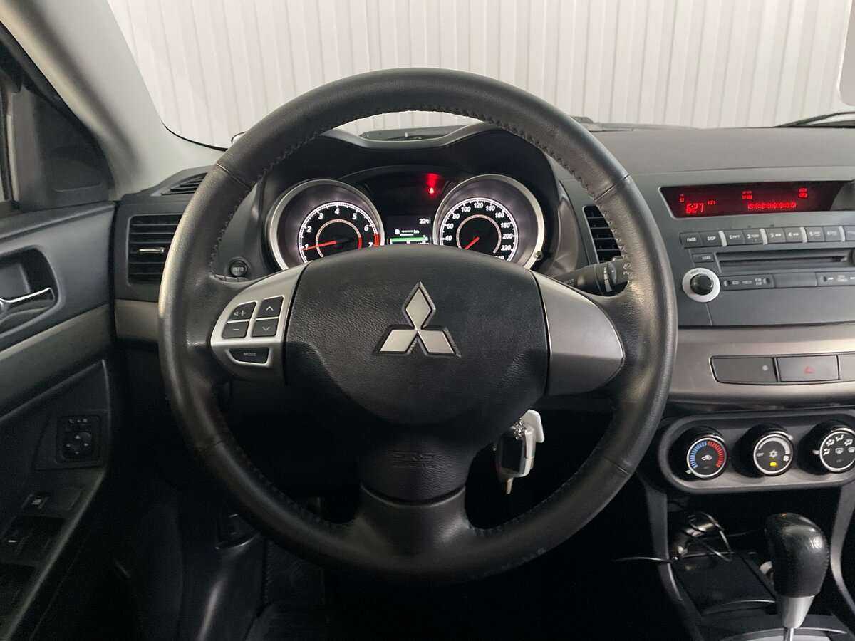 Купить Mitsubishi Lancer с пробегом. Фото: #8