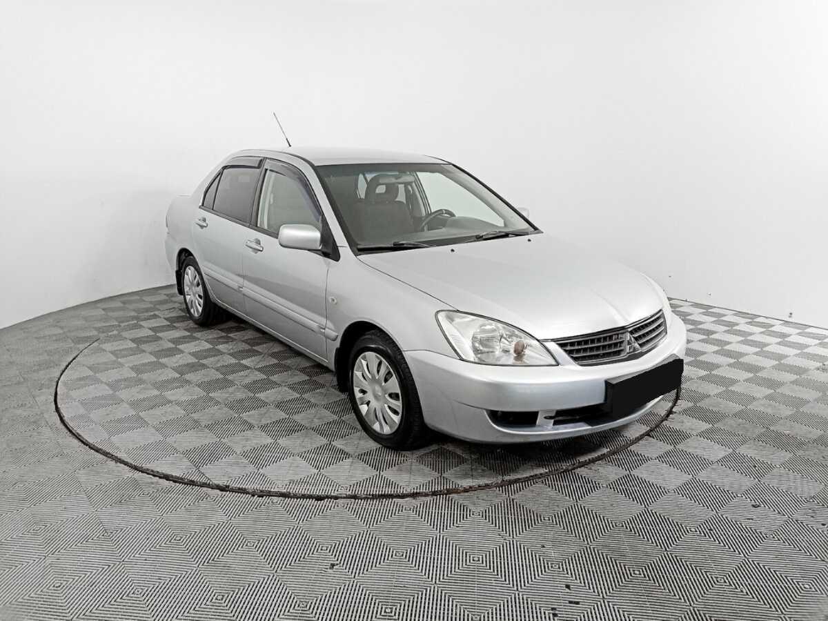 Купить Mitsubishi Lancer с пробегом. Фото: #2