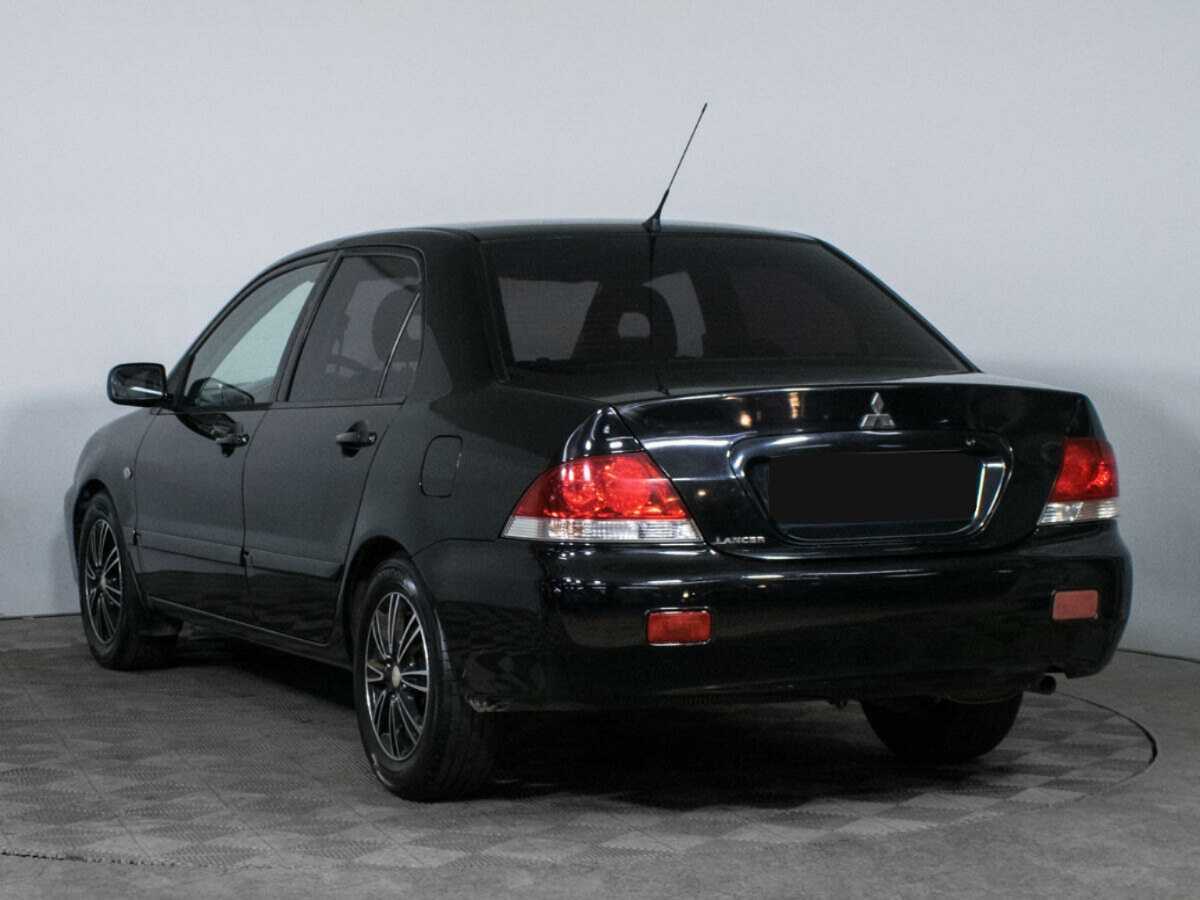 Купить Mitsubishi Lancer с пробегом. Фото: #6