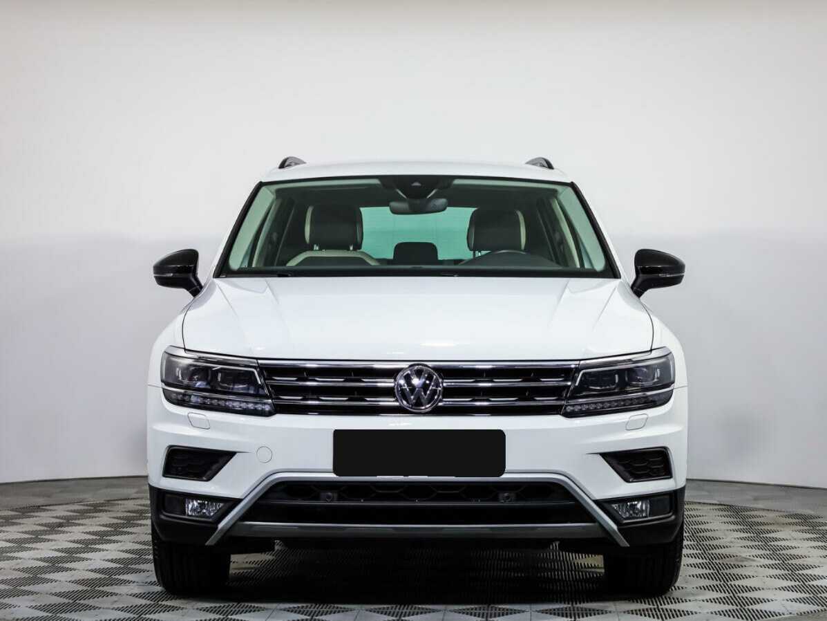 Купить Volkswagen Tiguan с пробегом. Посмотреть фото