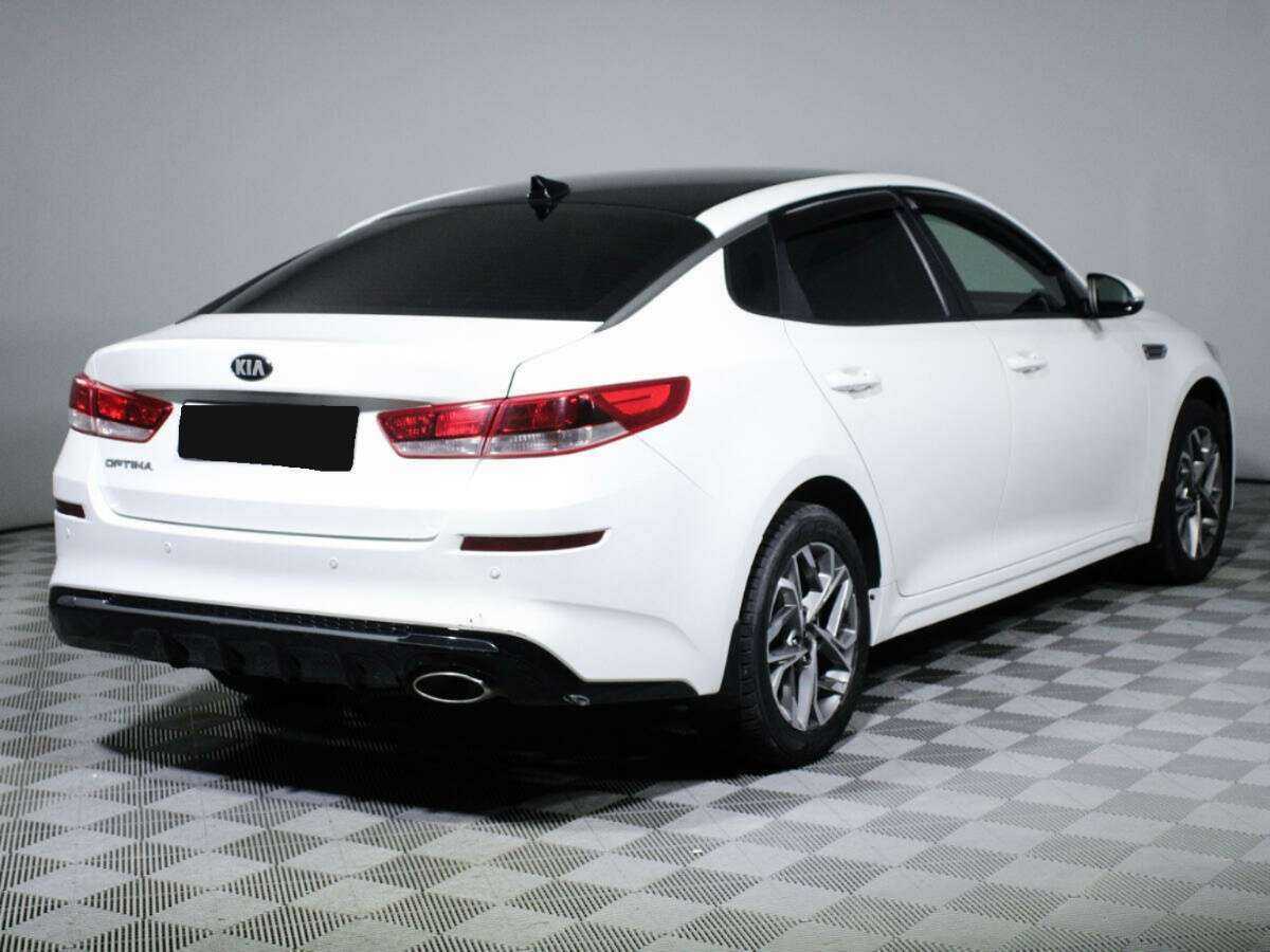 Купить Kia Optima с пробегом. Фото: #4