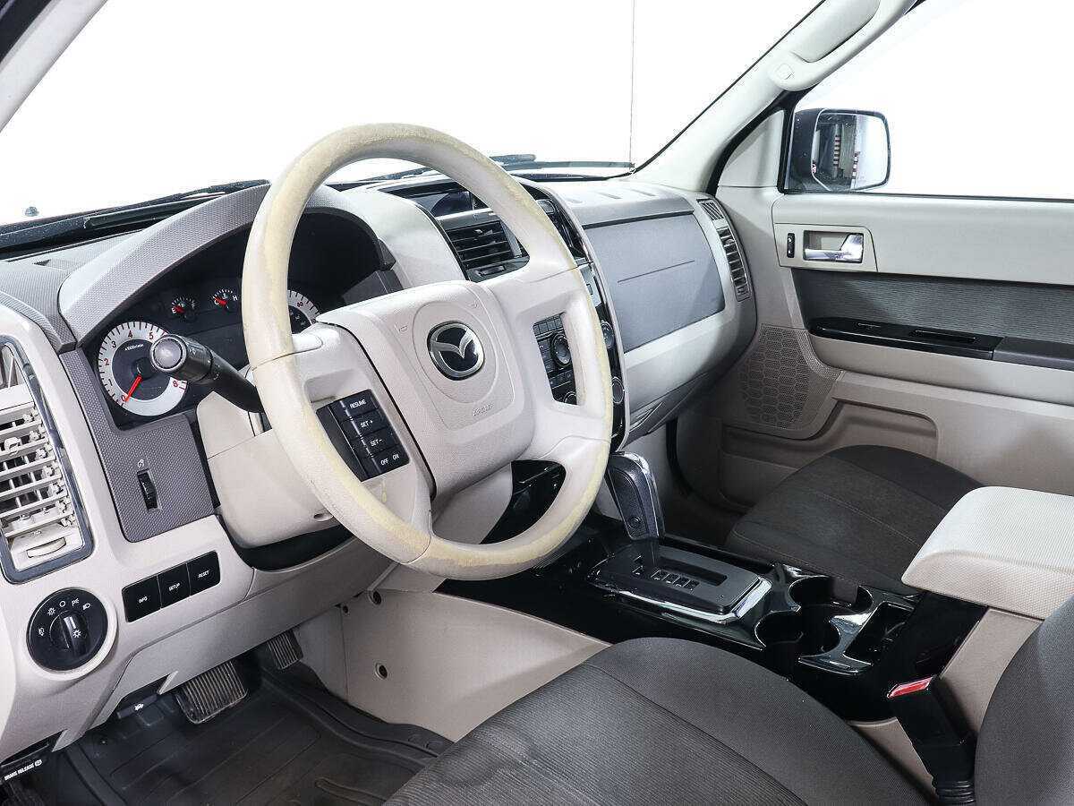 Купить Mazda Tribute с пробегом. Фото: #11