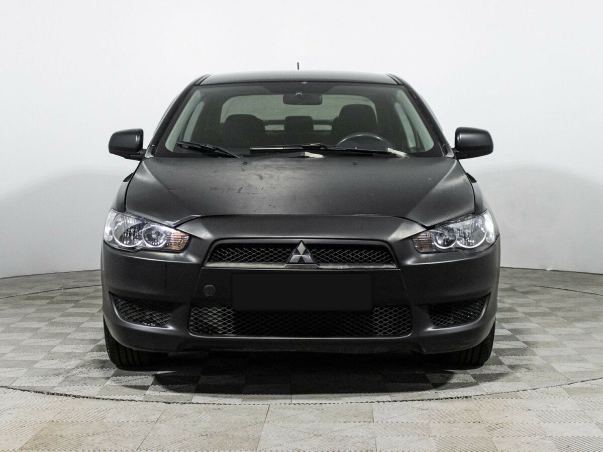 Купить Mitsubishi Lancer с пробегом. Фото: #1
