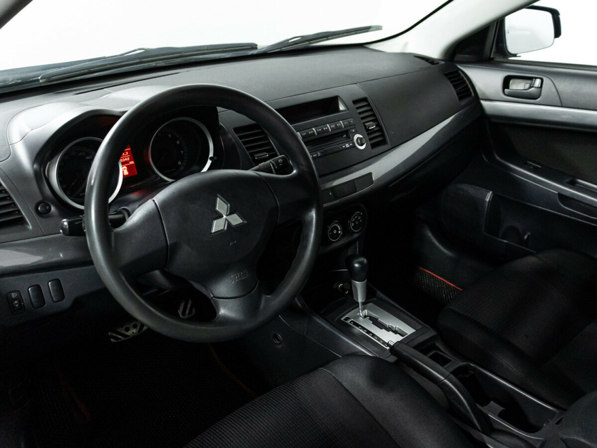 Купить Mitsubishi Lancer с пробегом. Фото: #10