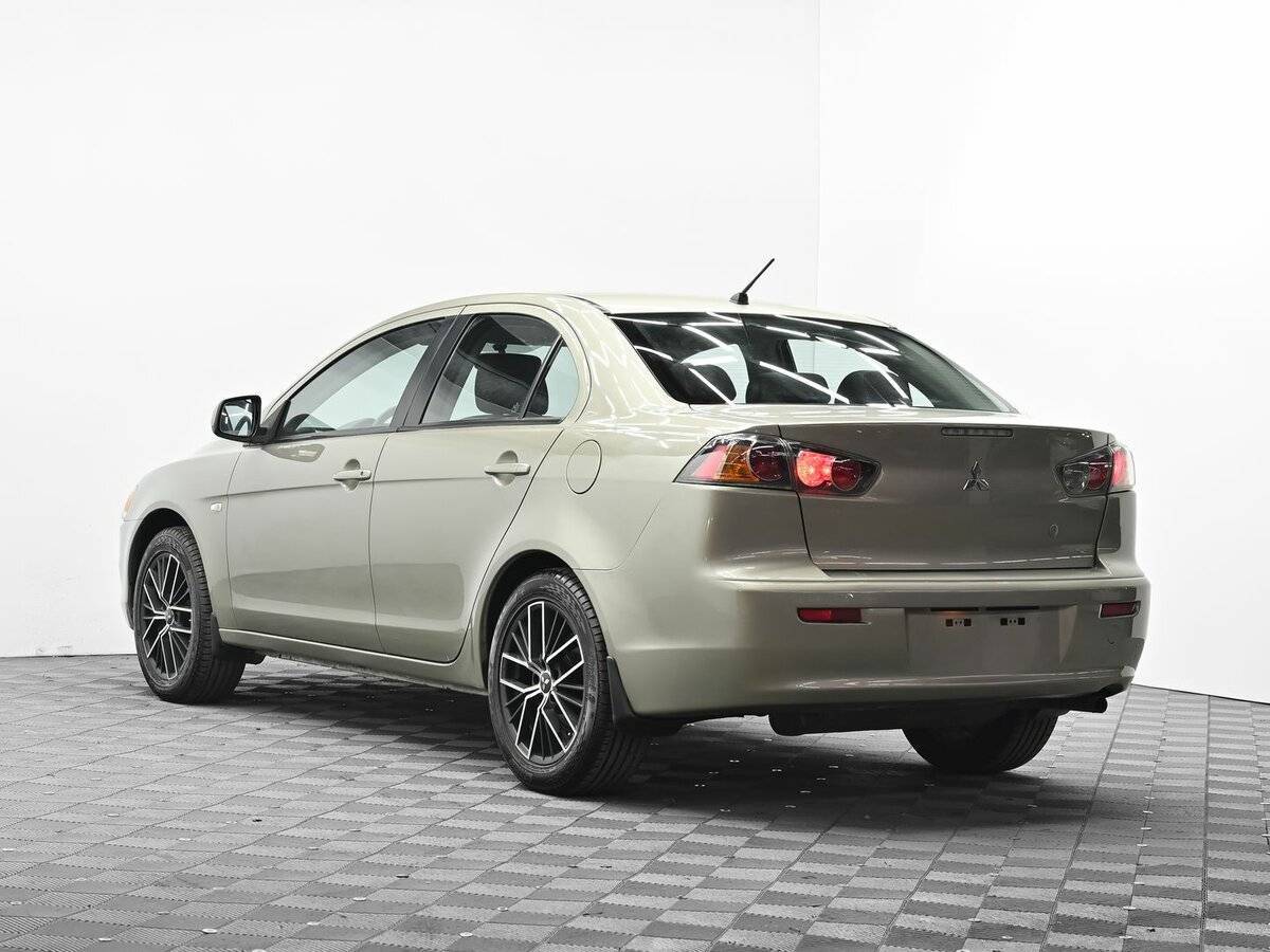 Купить Mitsubishi Lancer с пробегом. Фото: #2