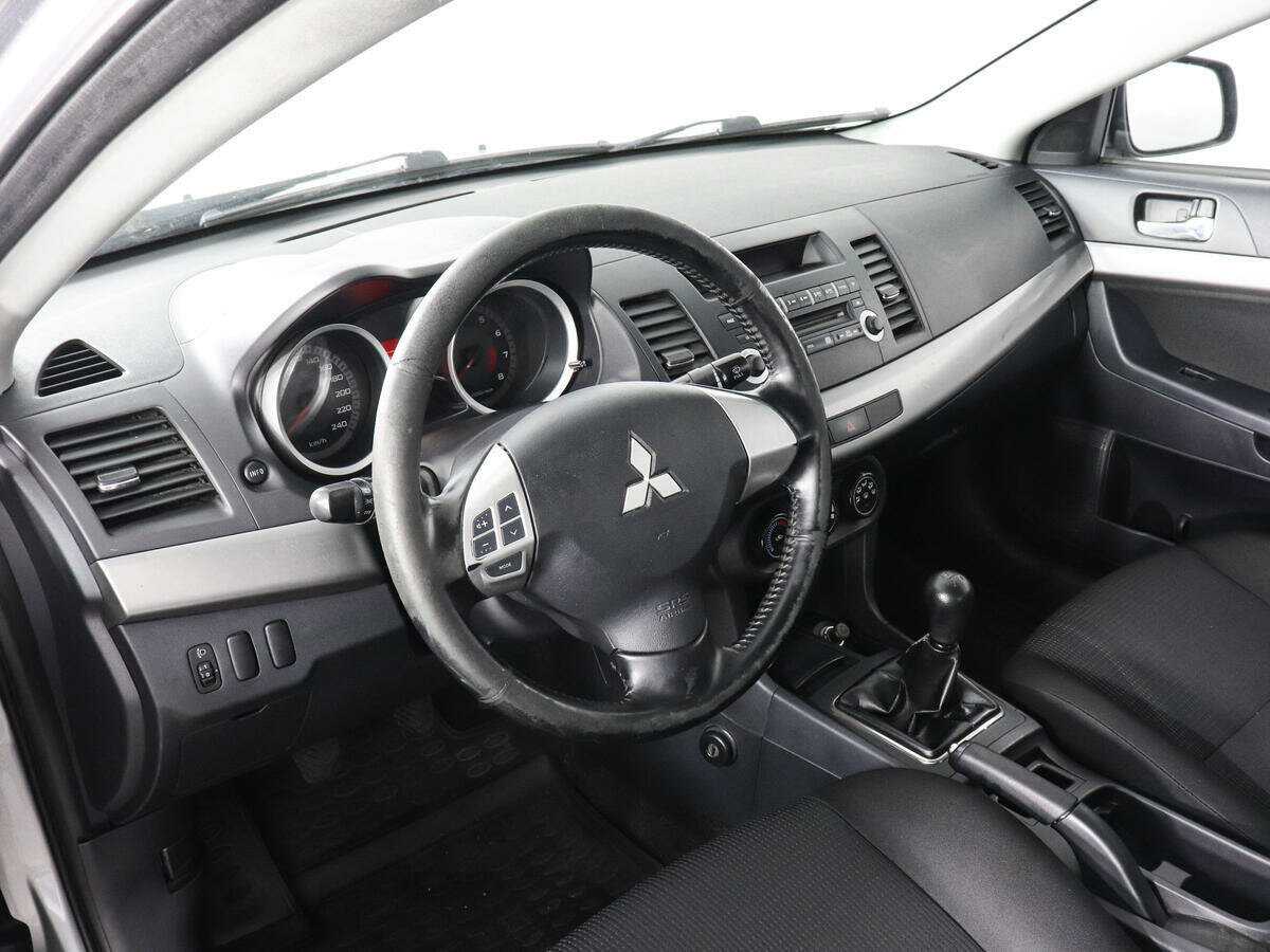 Купить Mitsubishi Lancer с пробегом. Фото: #4