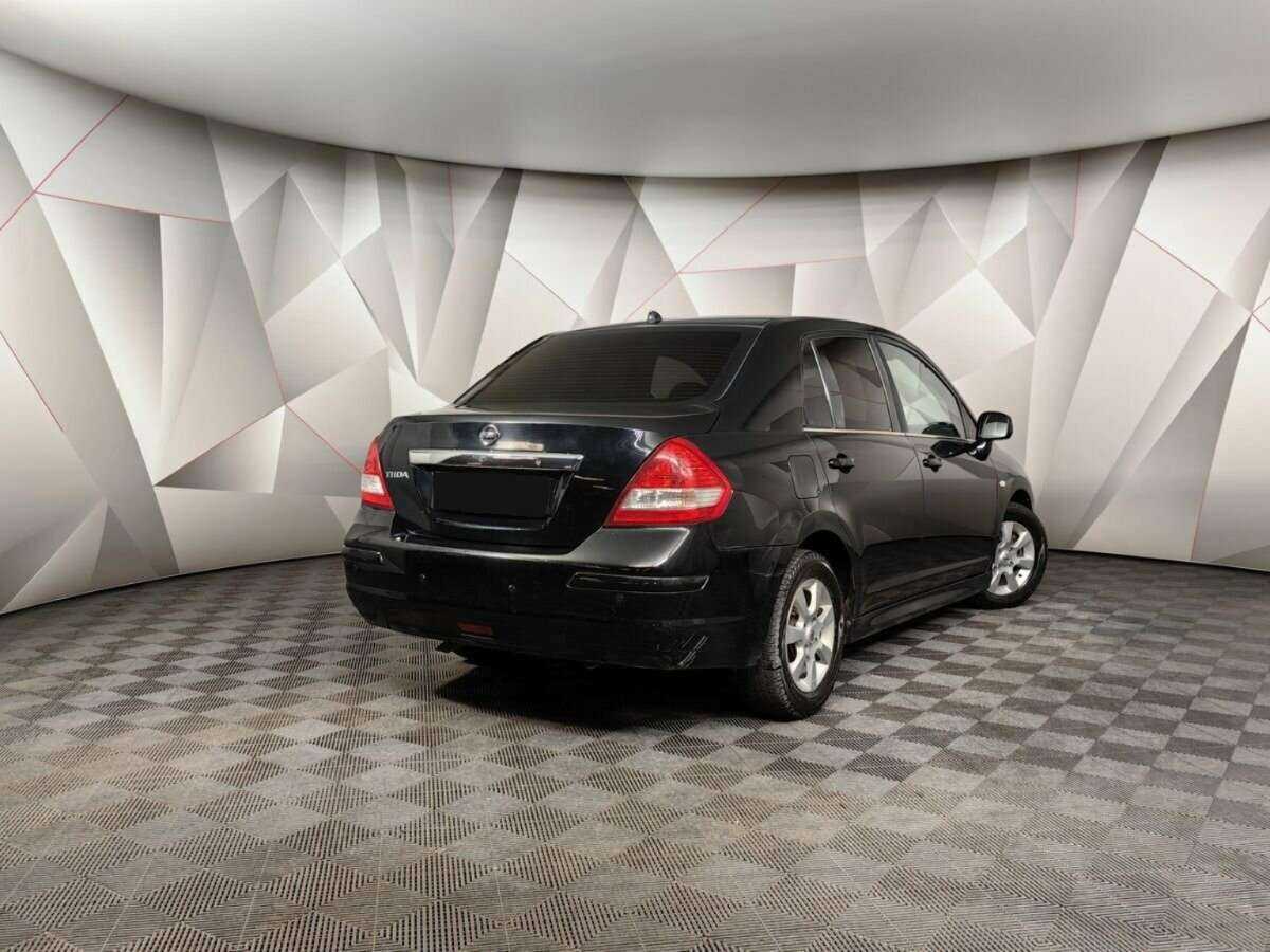 Купить Nissan Tiida с пробегом. Фото: #1