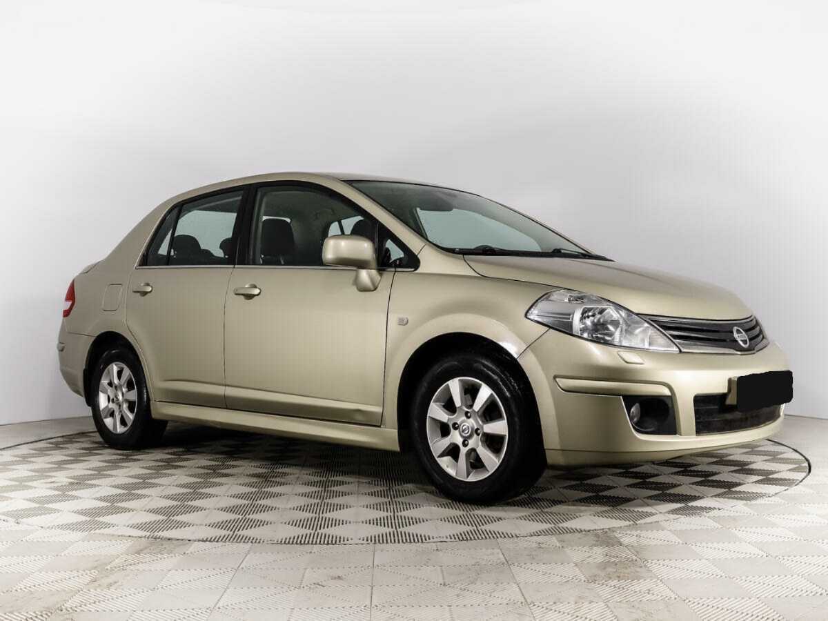 Купить Nissan Tiida с пробегом. Фото: #2