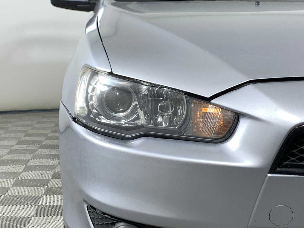 Купить Mitsubishi Lancer с пробегом. Фото: #9