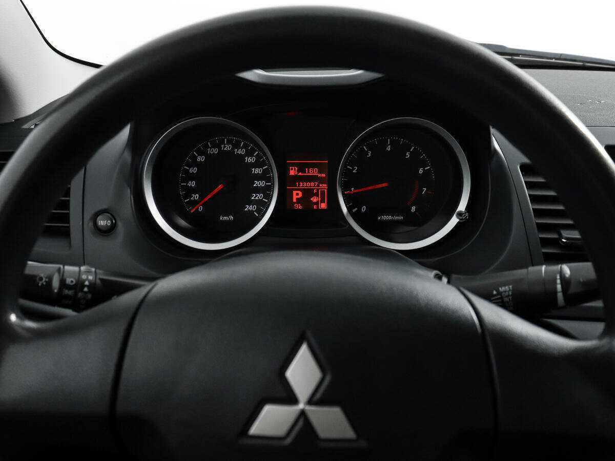 Купить Mitsubishi Lancer с пробегом. Фото: #15