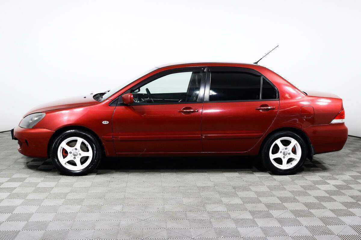 Купить Mitsubishi Lancer с пробегом. Фото: #7