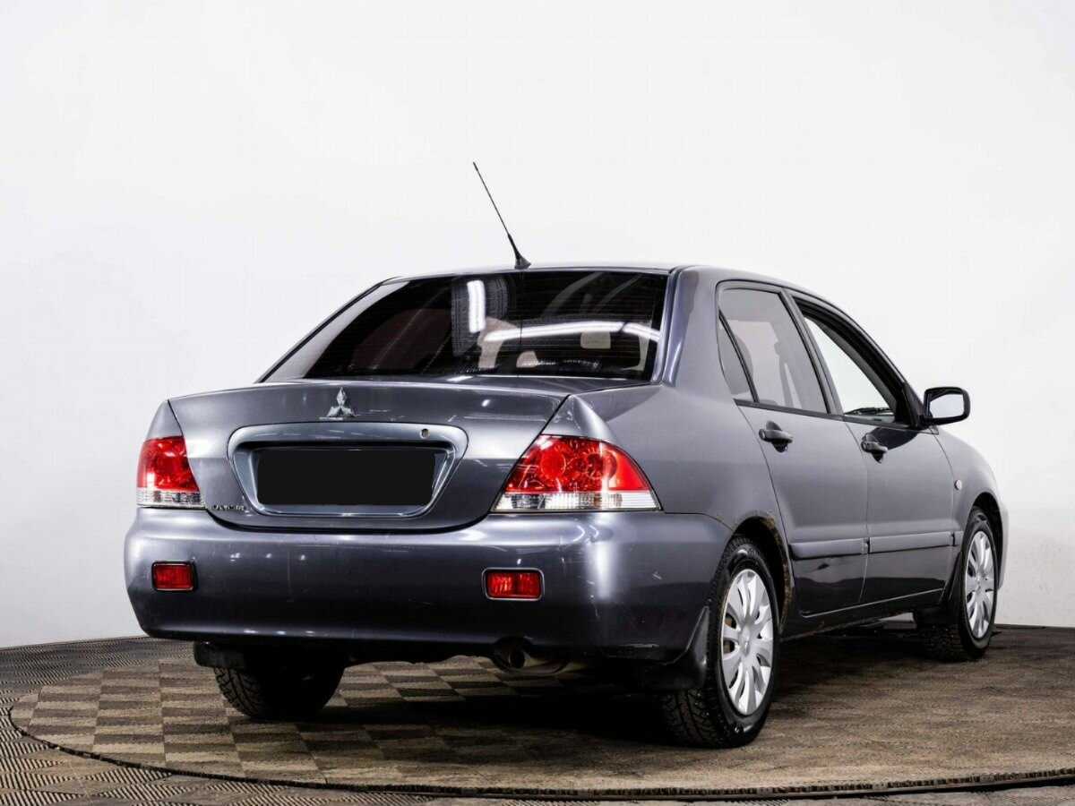 Купить Mitsubishi Lancer с пробегом. Фото: #5