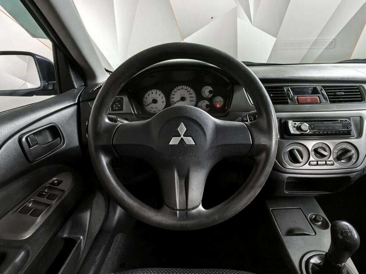 Купить Mitsubishi Lancer с пробегом. Фото: #14