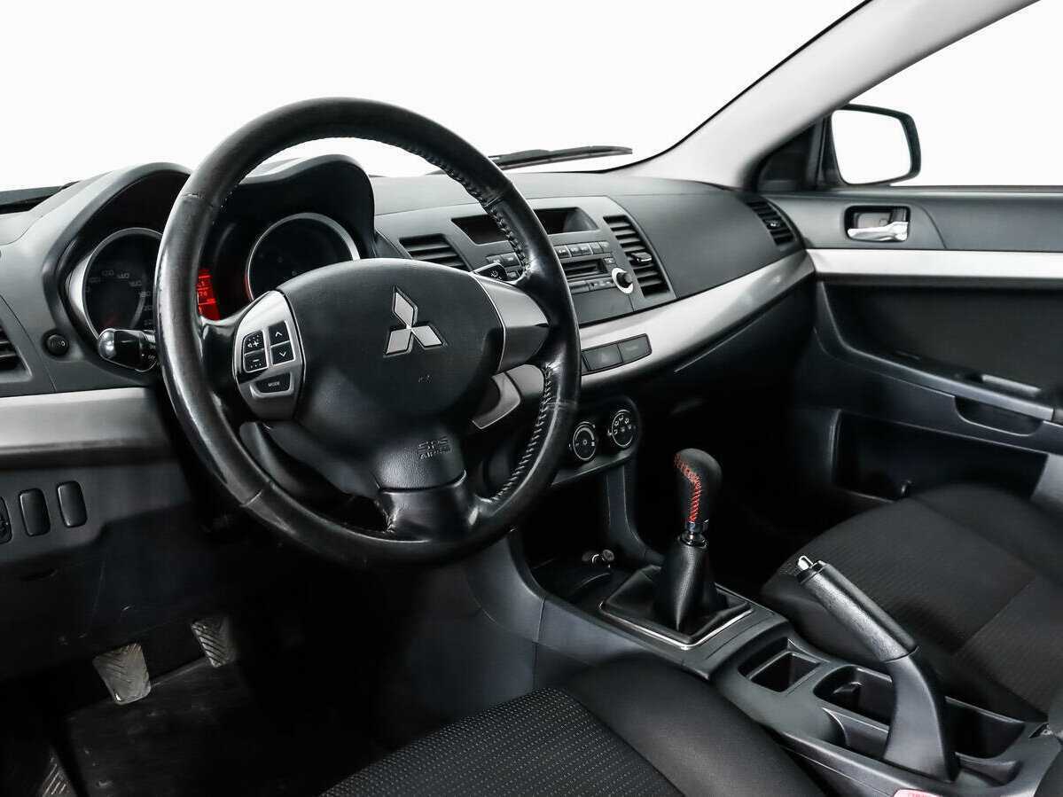 Купить Mitsubishi Lancer с пробегом. Фото: #8