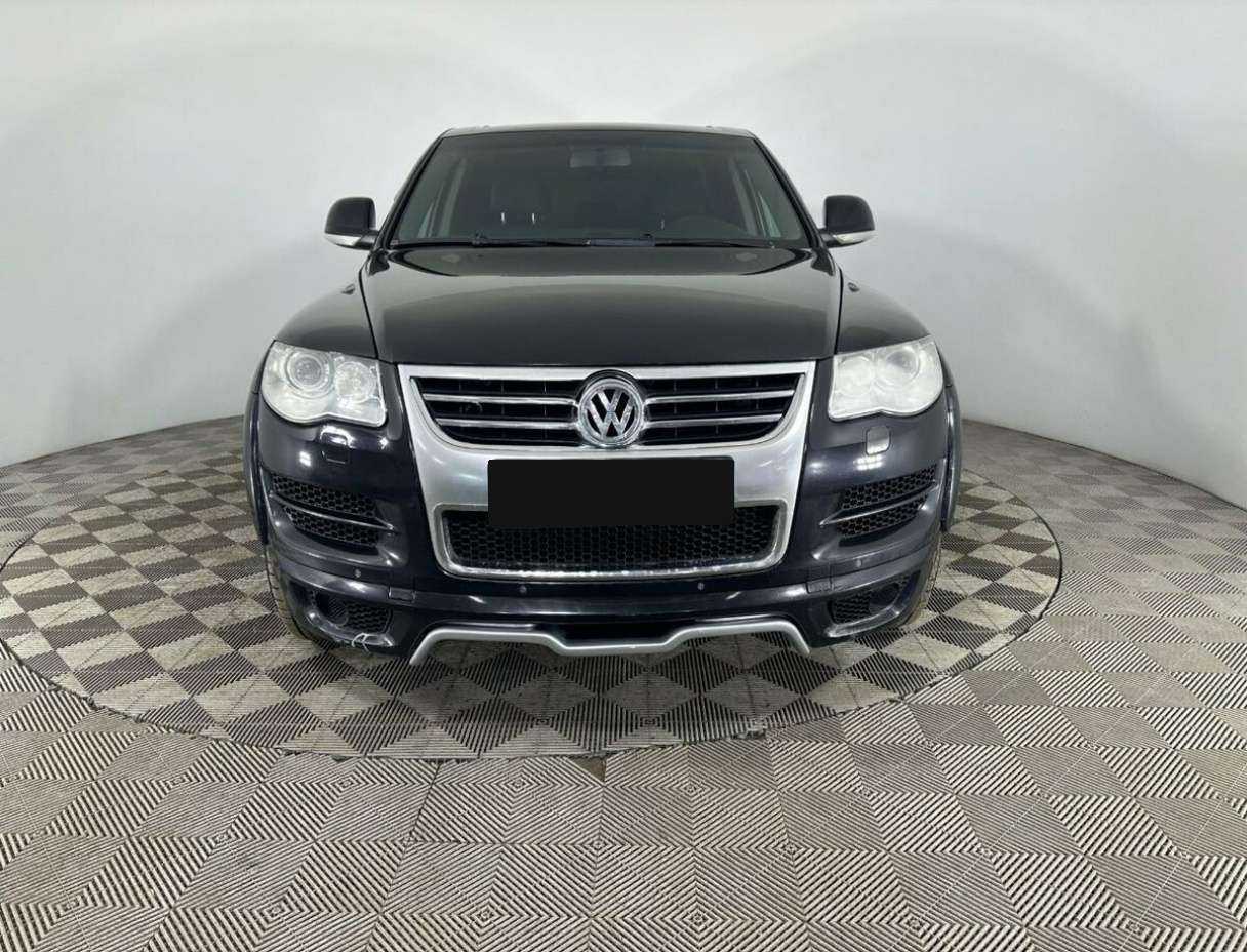 Купить Volkswagen Touareg с пробегом. Посмотреть фото