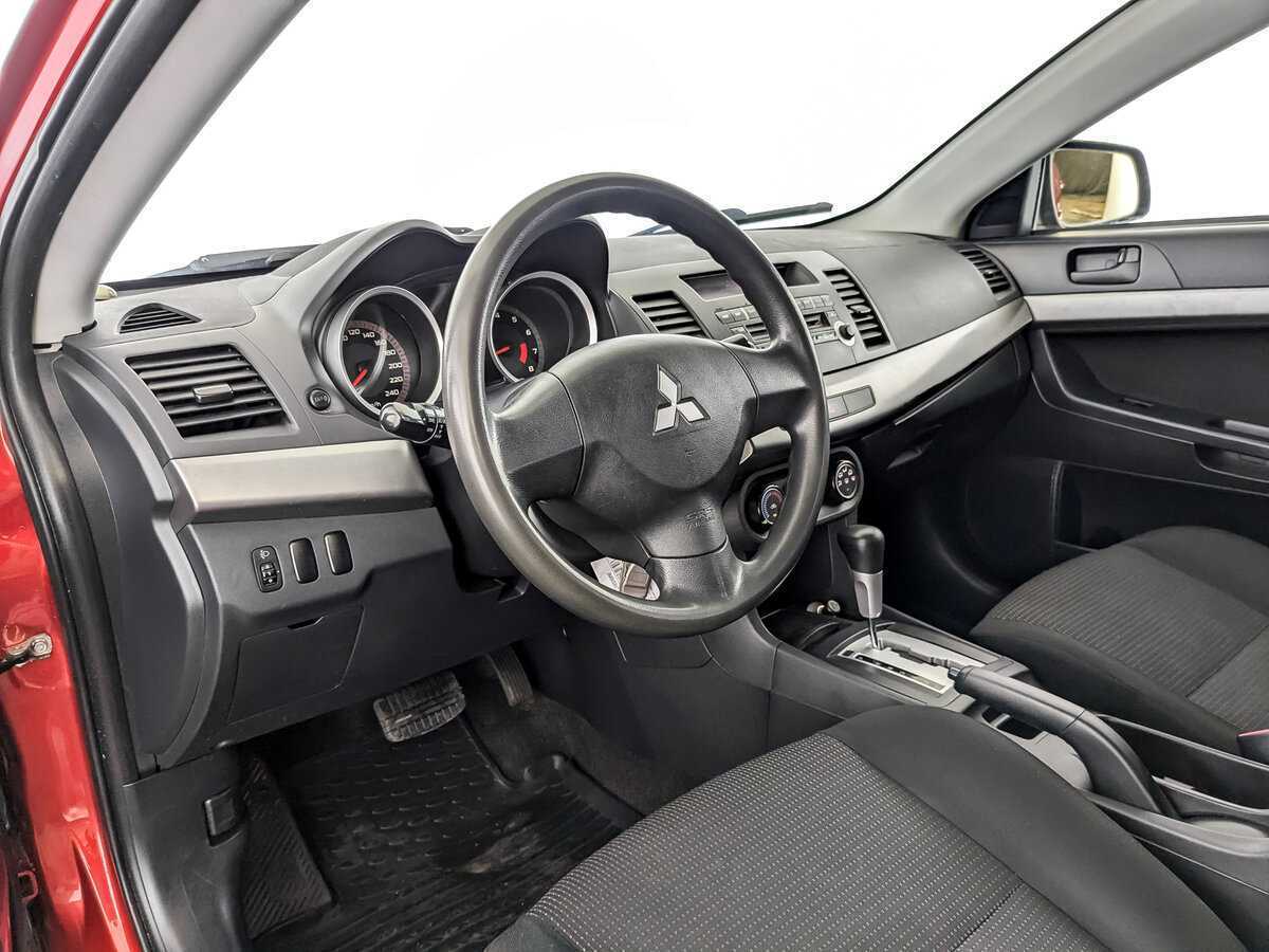 Купить Mitsubishi Lancer с пробегом. Фото: #14