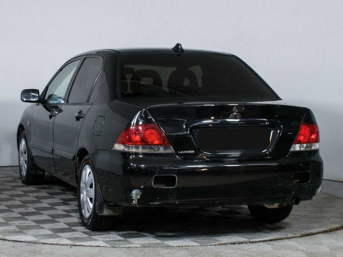 Купить Mitsubishi Lancer с пробегом. Фото: #5