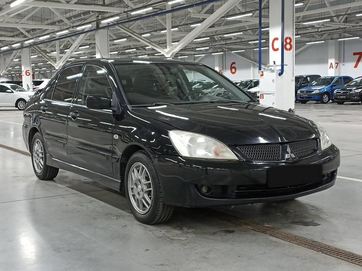 Купить Mitsubishi Lancer с пробегом. Фото: #2