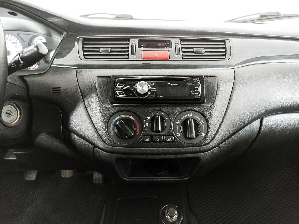 Купить Mitsubishi Lancer с пробегом. Фото: #14