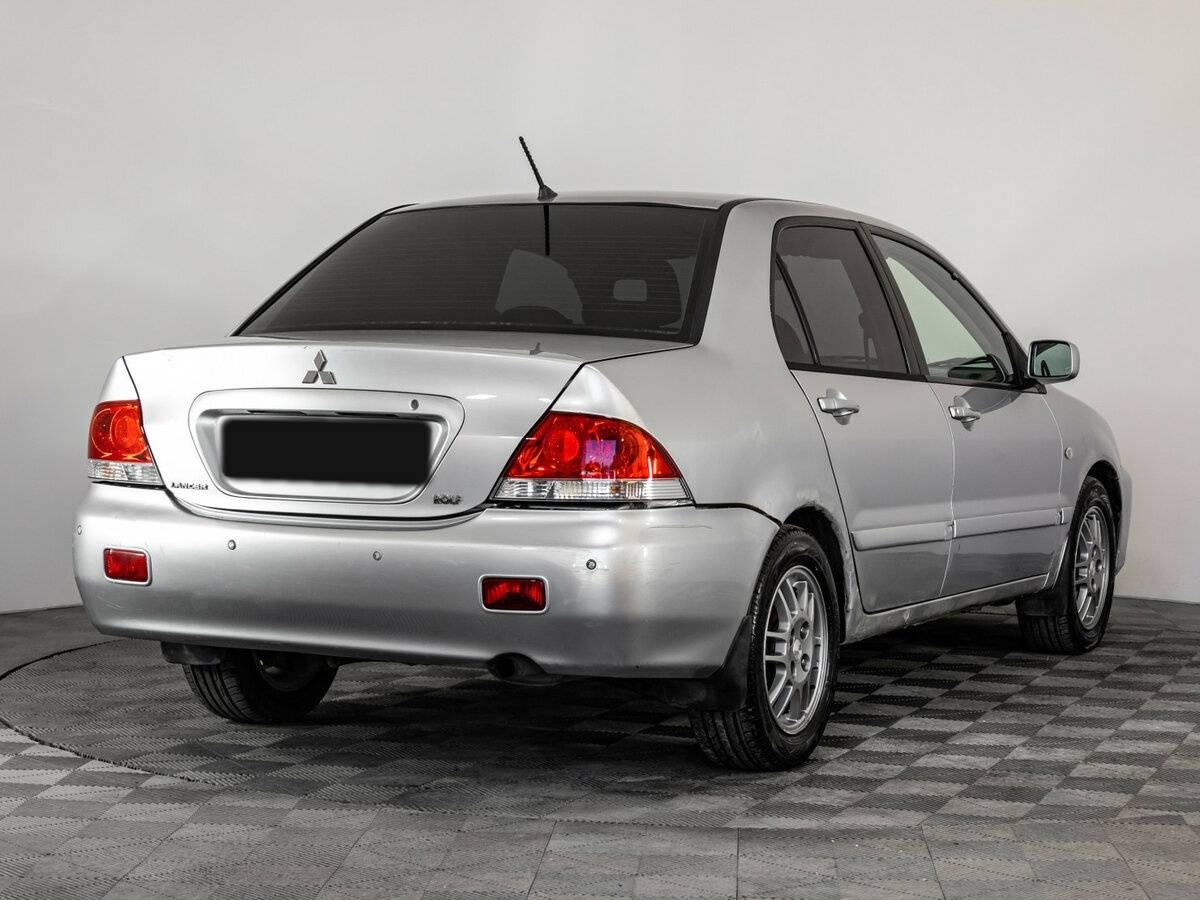 Купить Mitsubishi Lancer с пробегом. Фото: #3