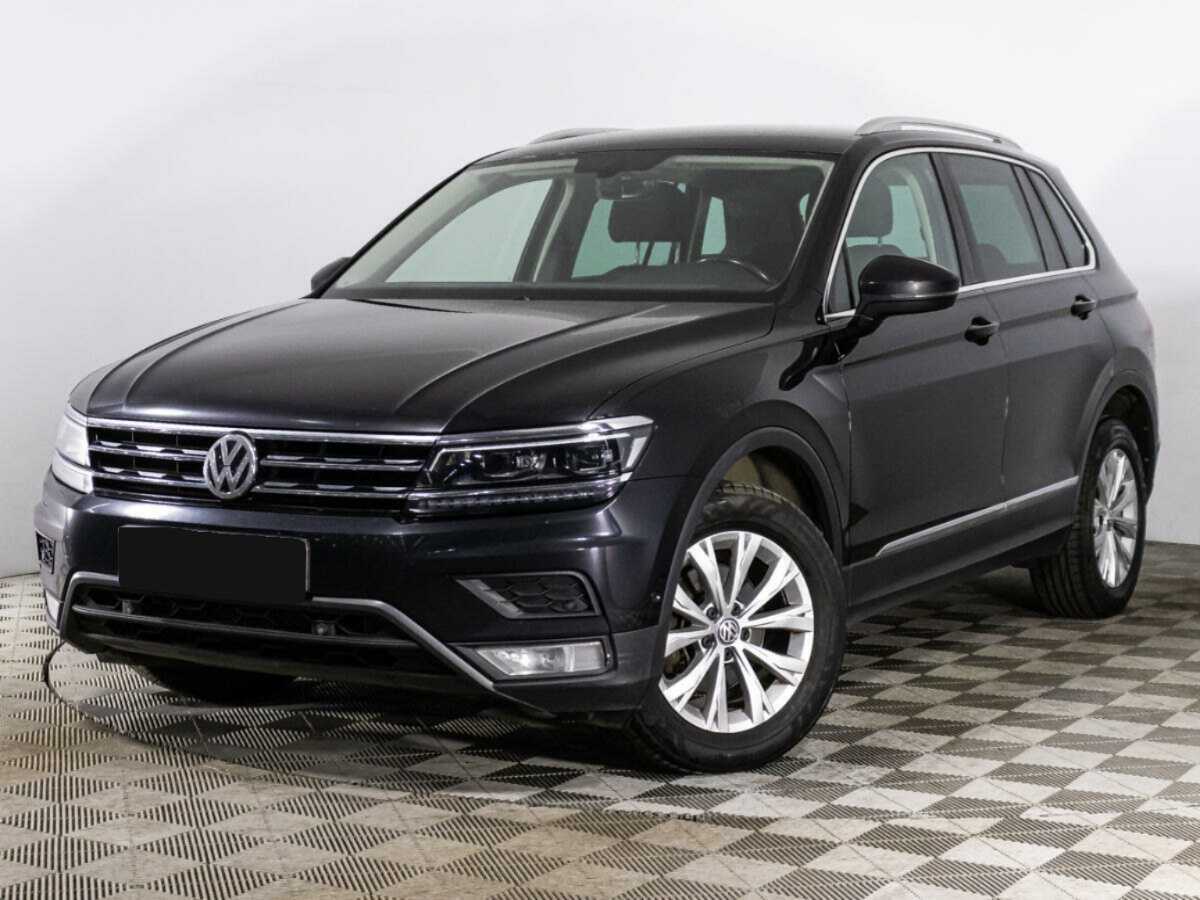 Купить Volkswagen Tiguan с пробегом. Посмотреть фото