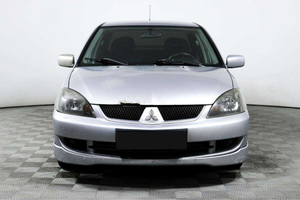 Купить Mitsubishi Lancer с пробегом. Фото: #1