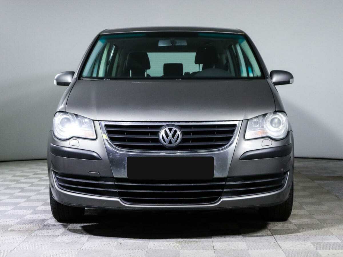 Купить Volkswagen Touran с пробегом. Фото: #1