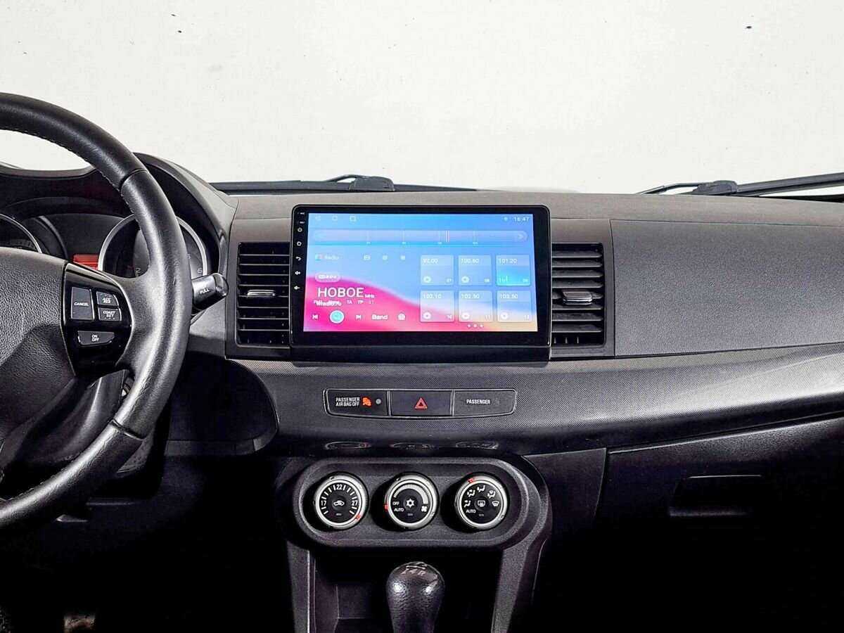 Купить Mitsubishi Lancer с пробегом. Фото: #10
