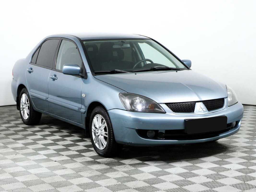 Купить Mitsubishi Lancer с пробегом. Фото: #2