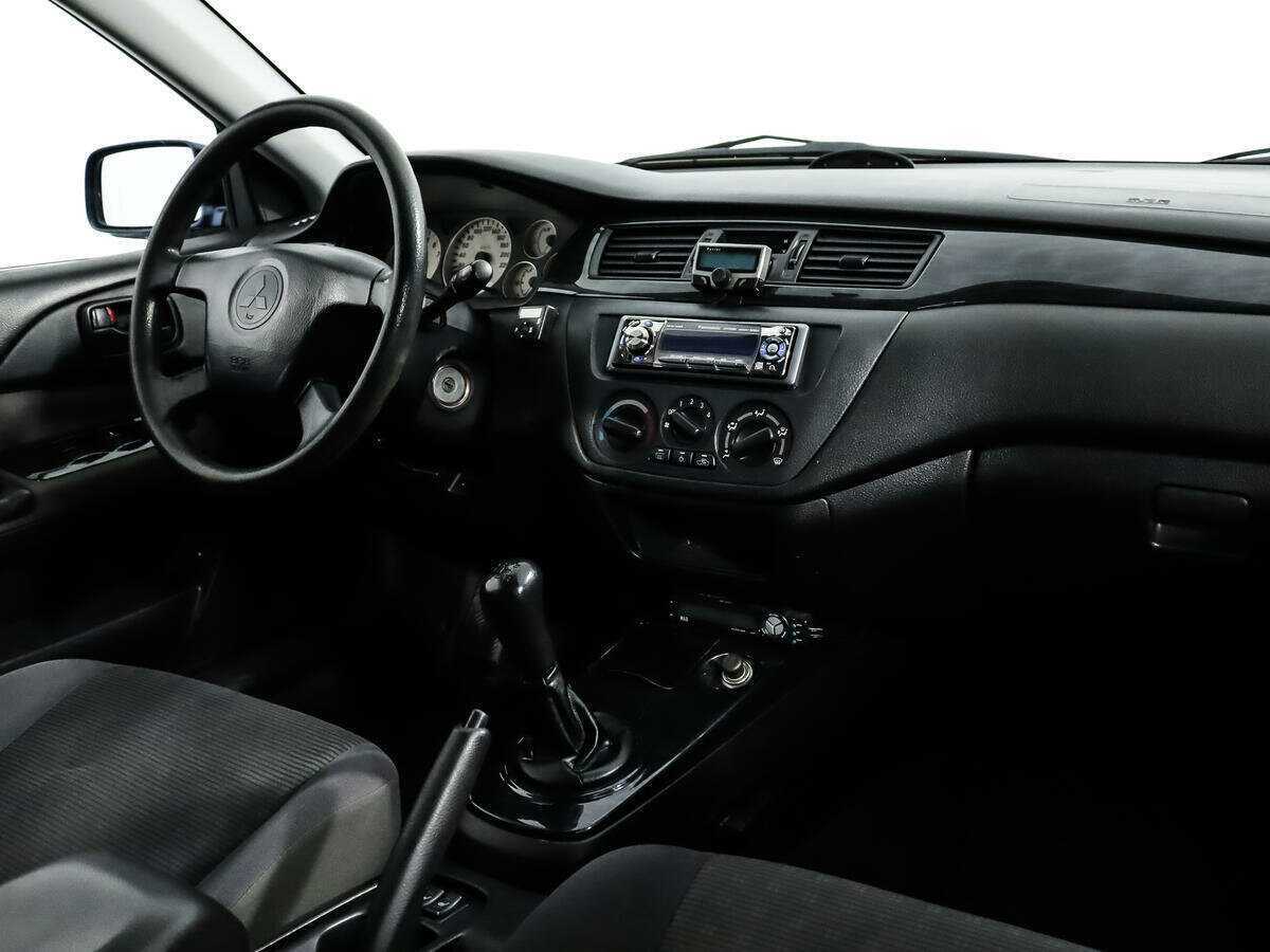 Купить Mitsubishi Lancer с пробегом. Фото: #12