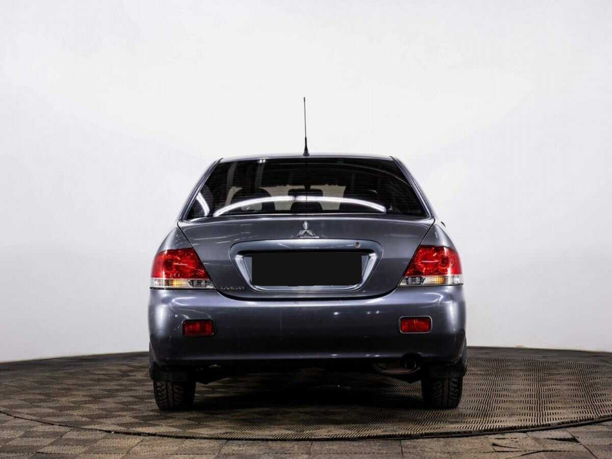 Купить Mitsubishi Lancer с пробегом. Фото: #4