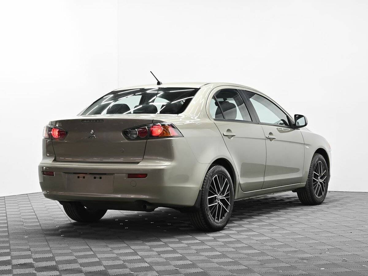 Купить Mitsubishi Lancer с пробегом. Фото: #3