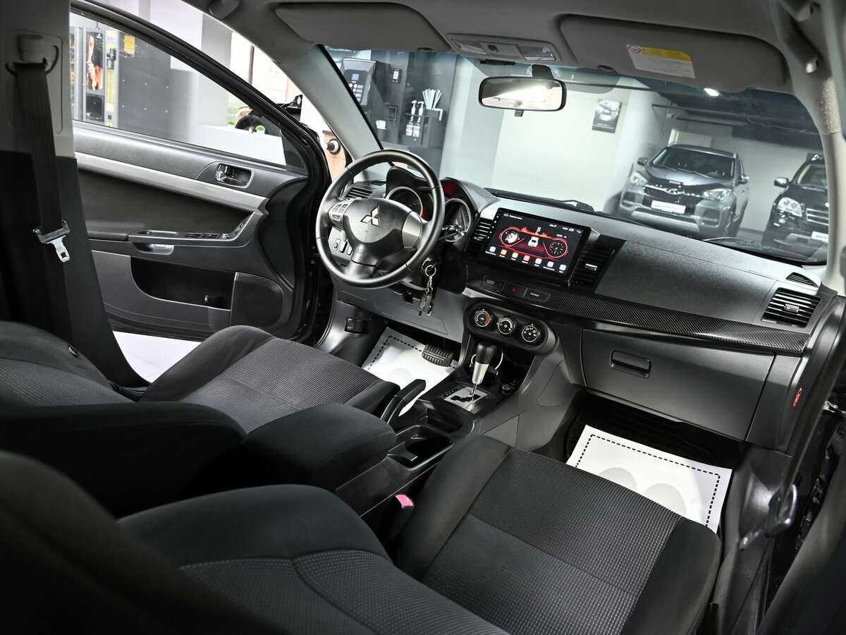 Купить Mitsubishi Lancer с пробегом. Фото: #5