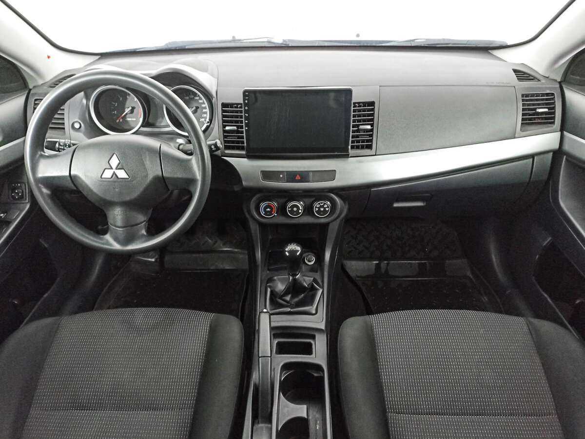 Купить Mitsubishi Lancer с пробегом. Фото: #11