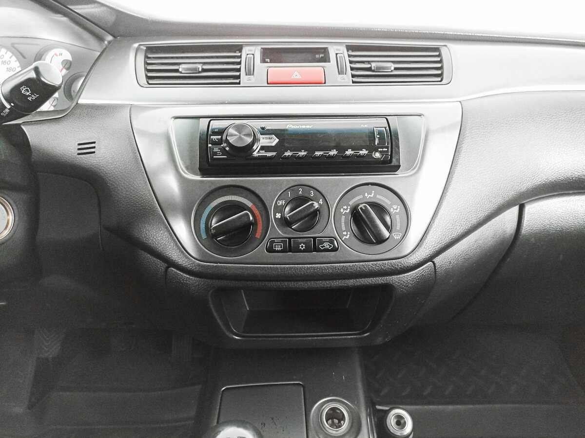 Купить Mitsubishi Lancer с пробегом. Фото: #12