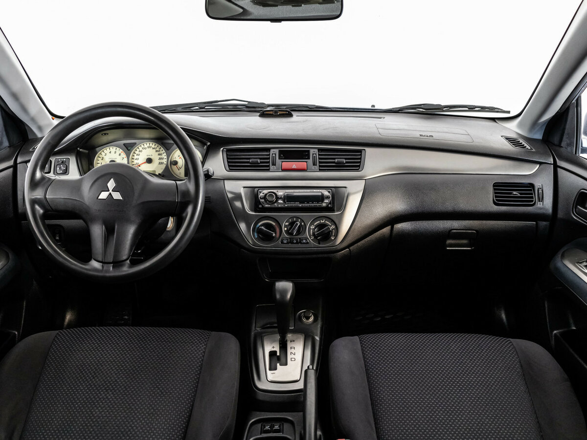 Купить Mitsubishi Lancer с пробегом. Фото: #7