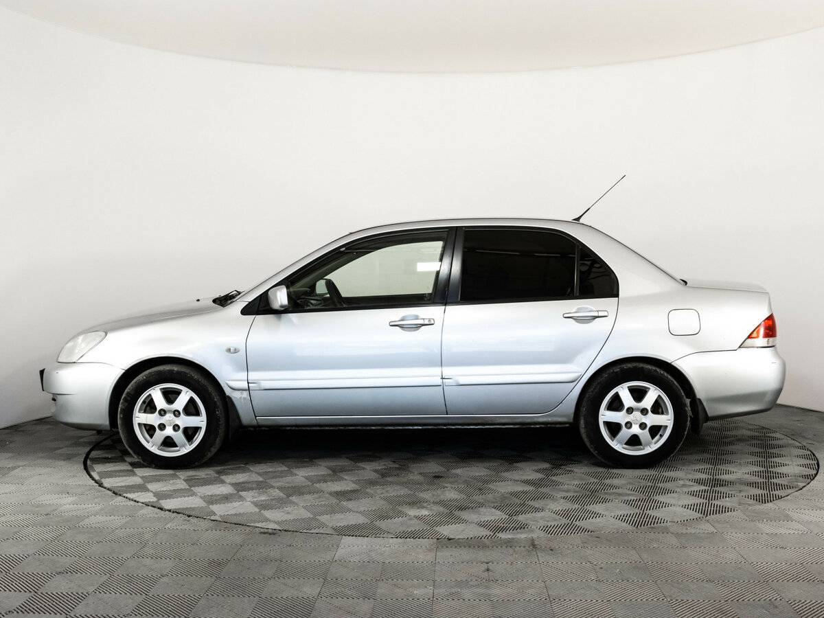 Купить Mitsubishi Lancer с пробегом. Фото: #7